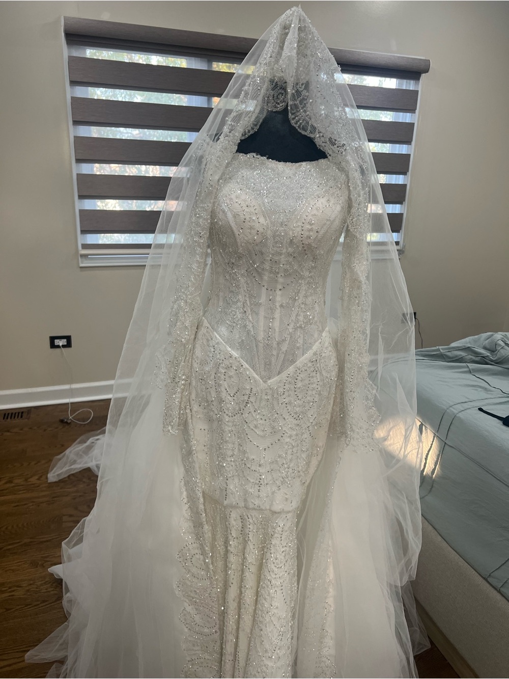 Elegant Beaded White Bridal Gown with Veil